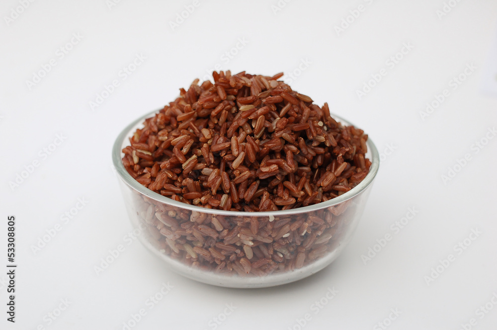 Cooked red rice in glass bowl Cooked red rice in glass bowl