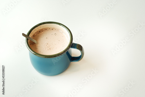 cup of hot cocoa on white background