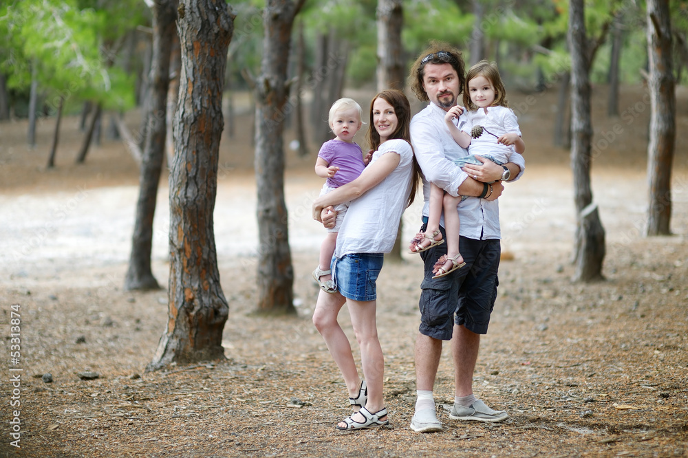 Fototapeta premium Family of four at summer day