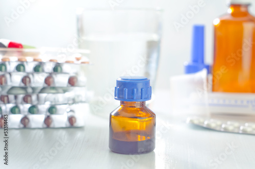 bottle, tablets and capsules