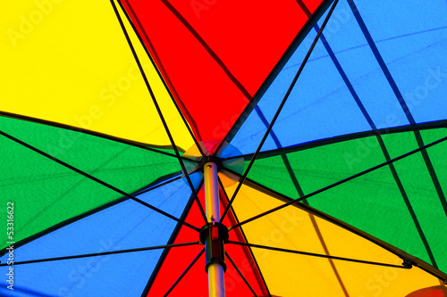 Under of colorful umbrella