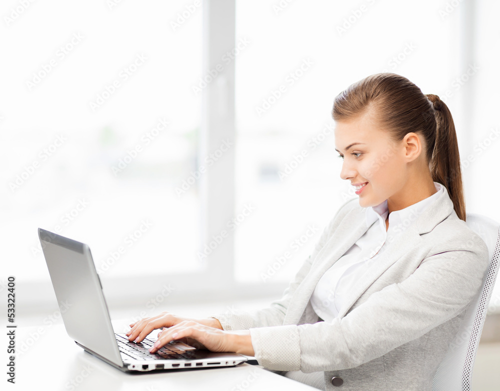 businesswoman with laptop in office businesswoman with laptop in office