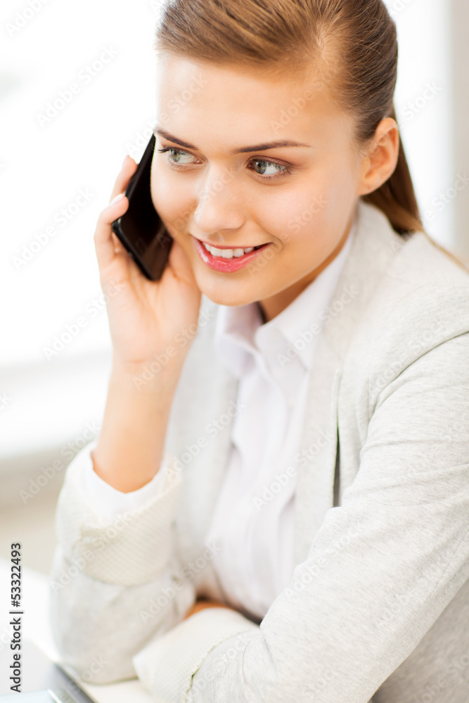 businesswoman with smartphone in office businesswoman with smartphone in office