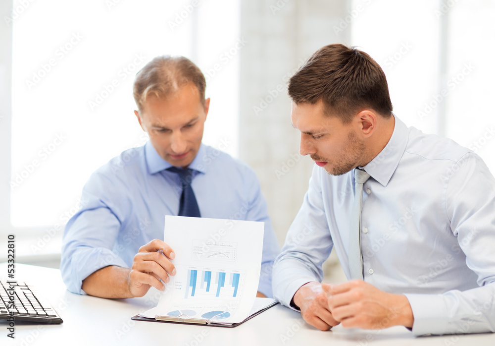 businessmen with notebook on meeting businessmen with notebook on meeting
