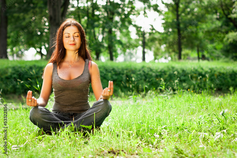 yoga woman on green park