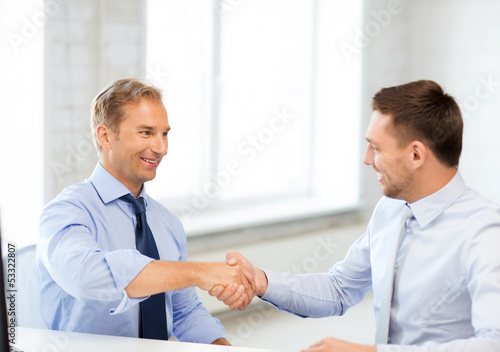 Wallpaper Mural businessmen shaking hands in office Torontodigital.ca