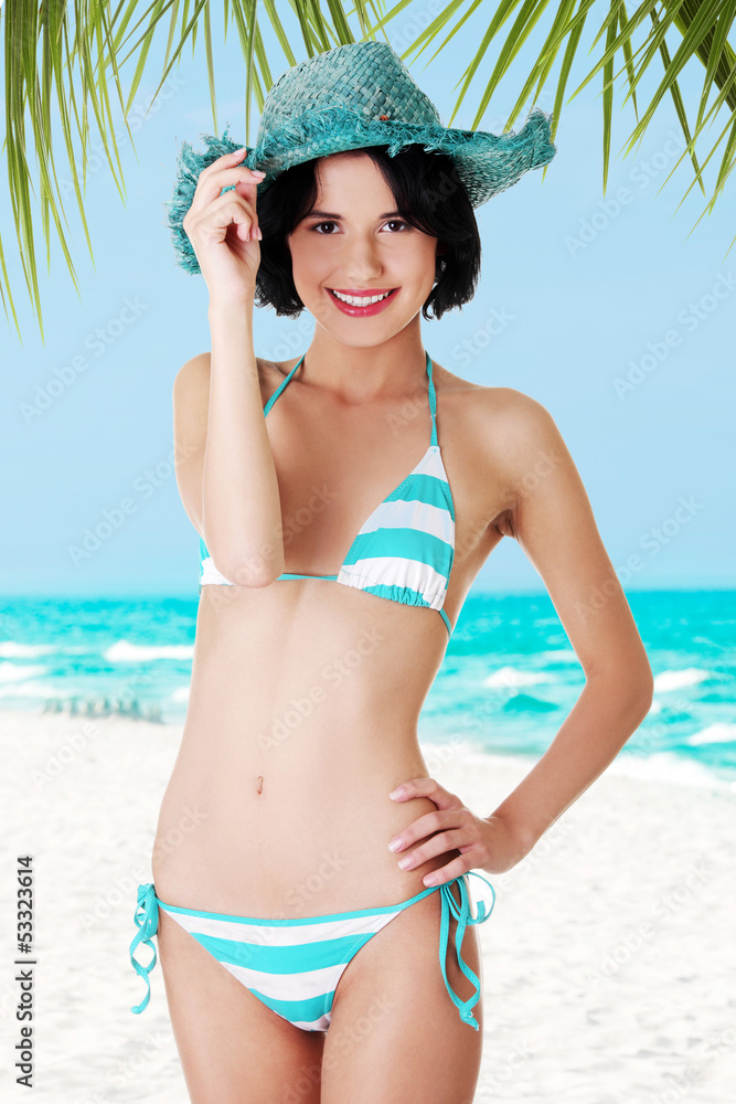 Sexy brunette woman posing in bikini