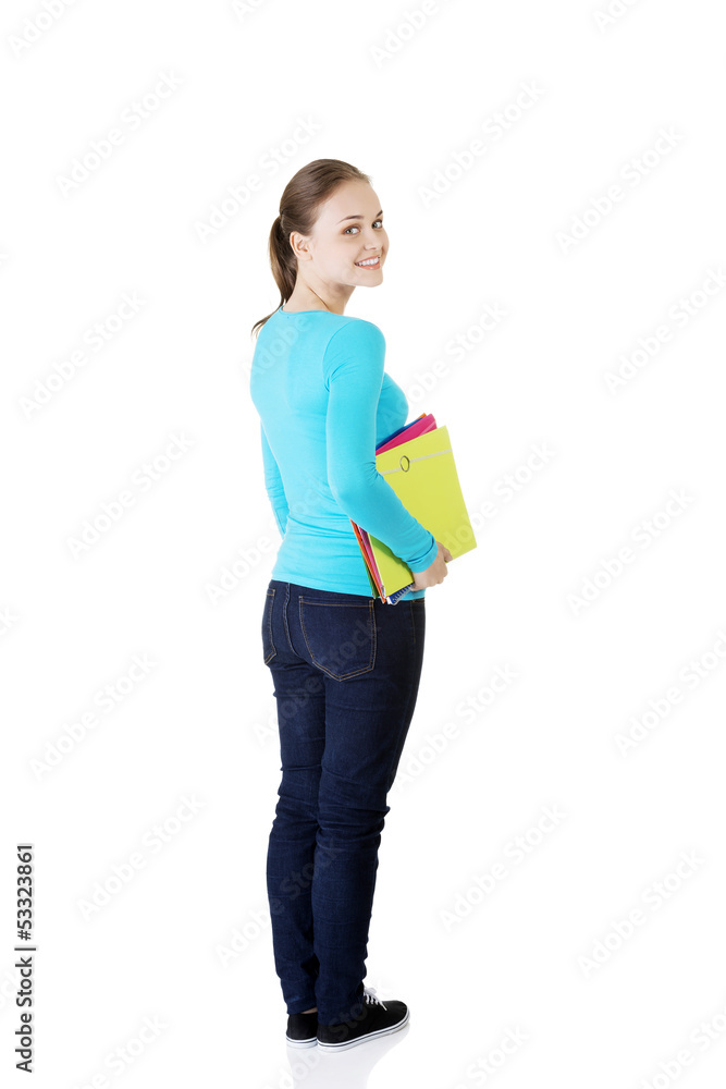 Happy student woman with notebooks