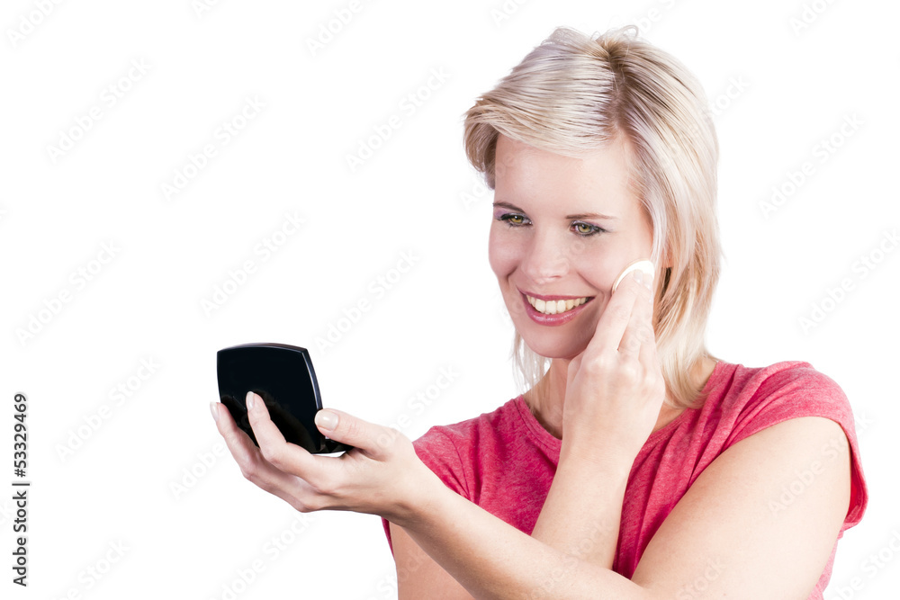 Young attractive woman wearing makeup itself. Young attractive woman wearing makeup itself.