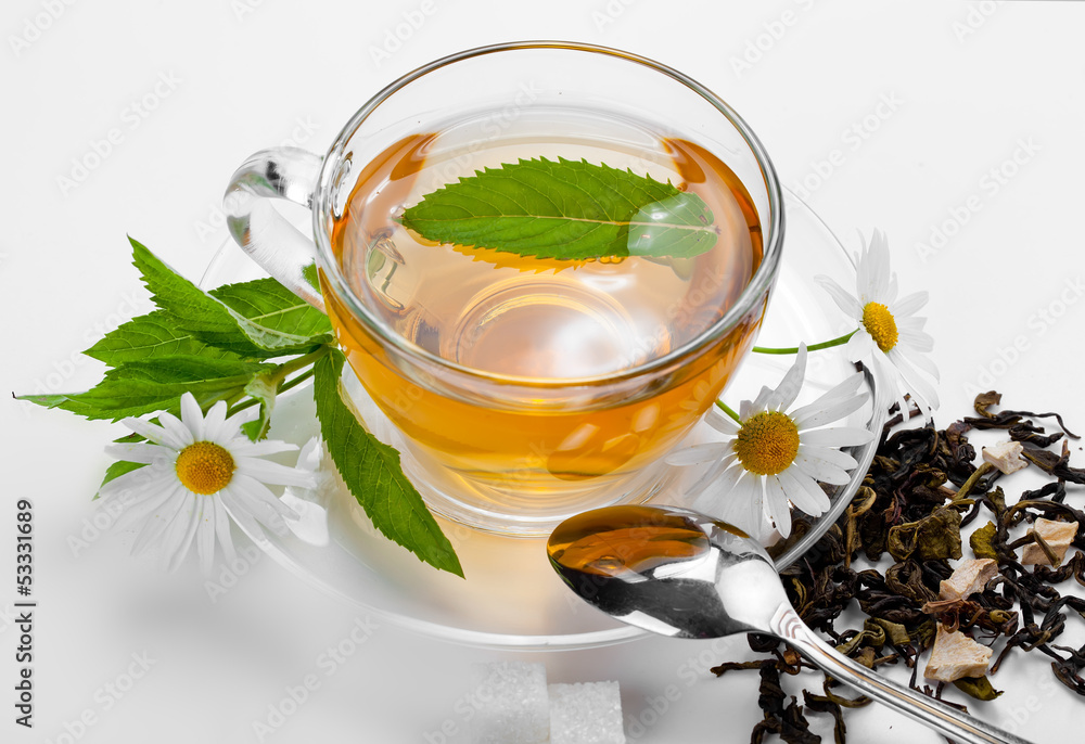 Cup with green tea and green leaves. Cup with green tea and green leaves.