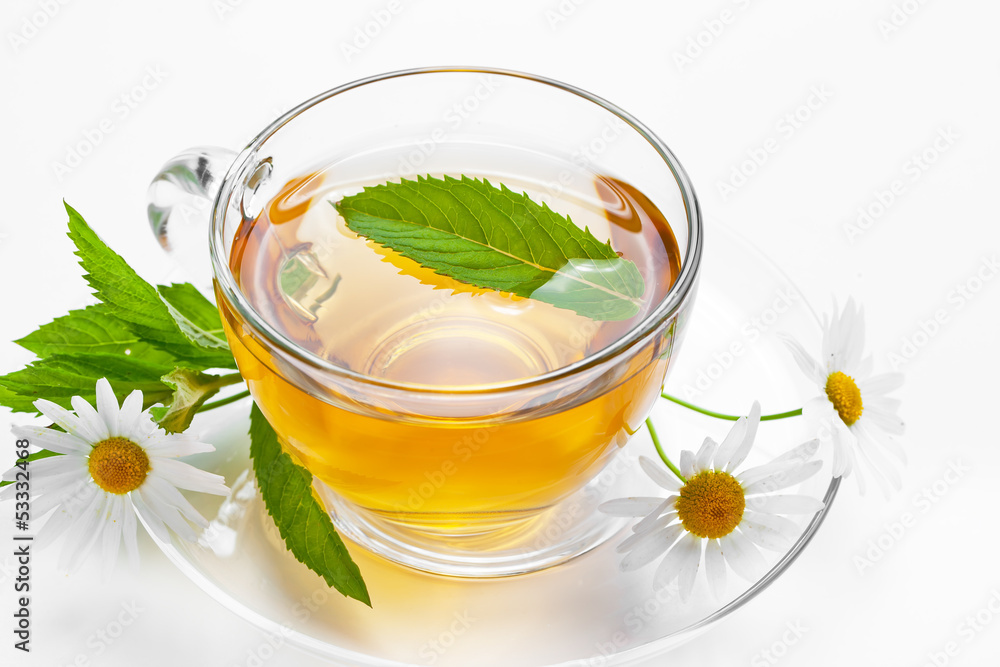 Cup with green tea and green leaves. Cup with green tea and green leaves.