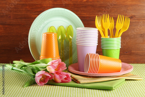 Fototapeta Naklejka Na Ścianę i Meble -  Multicolored plastic tableware