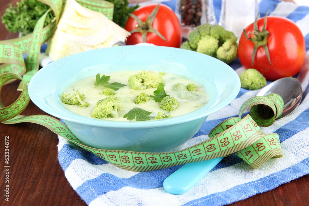 Cabbage soup in plates on napkin on wooden table Cabbage soup in plates on napkin on wooden table