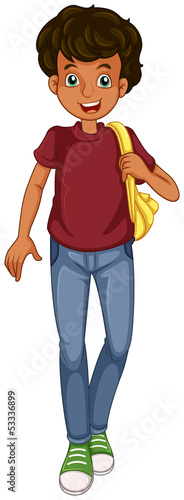 A boy walking with a bag