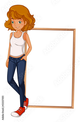 A girl wearing a sando and a tight jeans in front of an empty bo