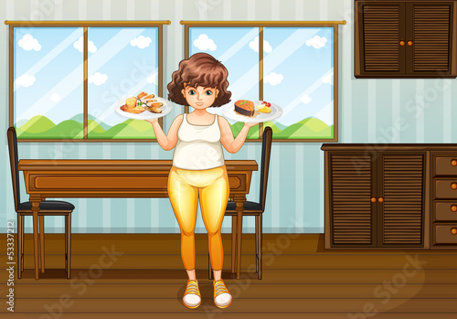 A woman holding foods in the kitchen