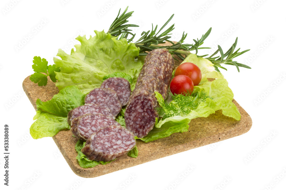 Salami with rosemary, salad and tomatoes Salami with rosemary, salad and tomatoes