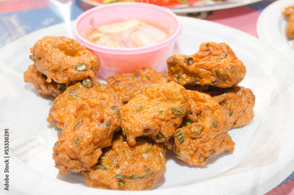 Fried fish mixed with spices. Fried fish mixed with spices.