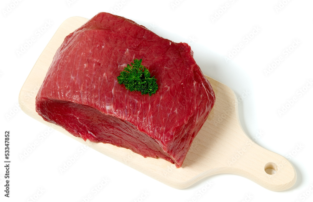Raw sliced meat on cutting board Raw sliced meat on cutting board