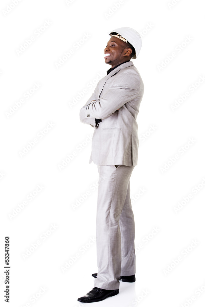 Happy successful businesman in helmet. Happy successful businesman in helmet.