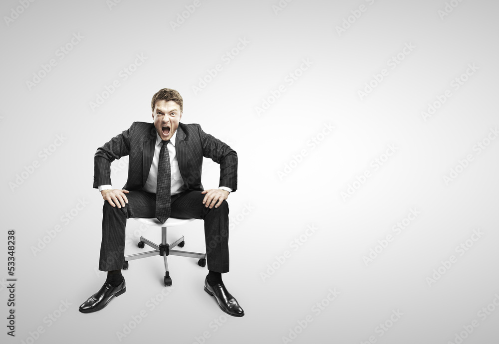 businessman sitting on chair businessman sitting on chair