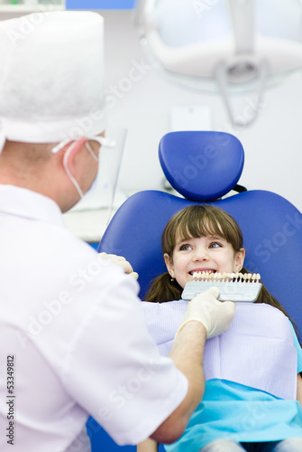little girl with palette for tooth color