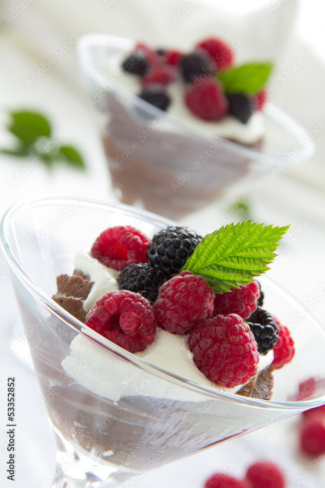 Chocolate mousse with raspberries and cream. Chocolate mousse with raspberries and cream.