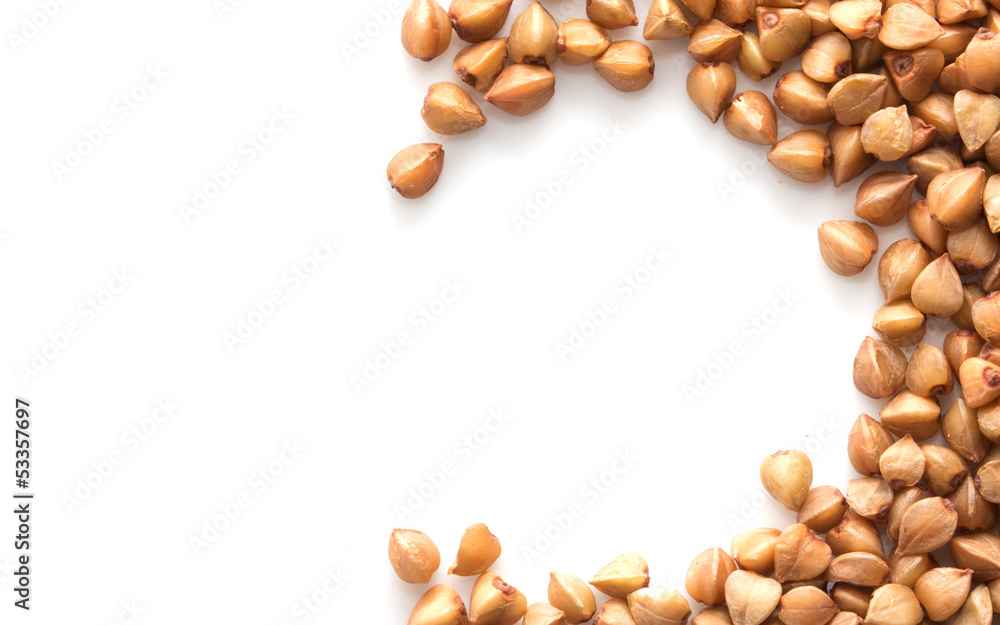 a little pile of buckwheat isolated on white a little pile of buckwheat isolated on white