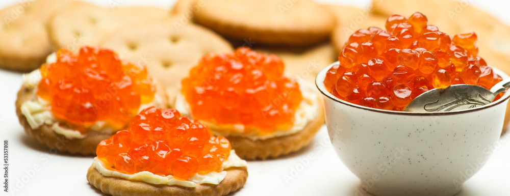 red caviar on a cracker red caviar on a cracker