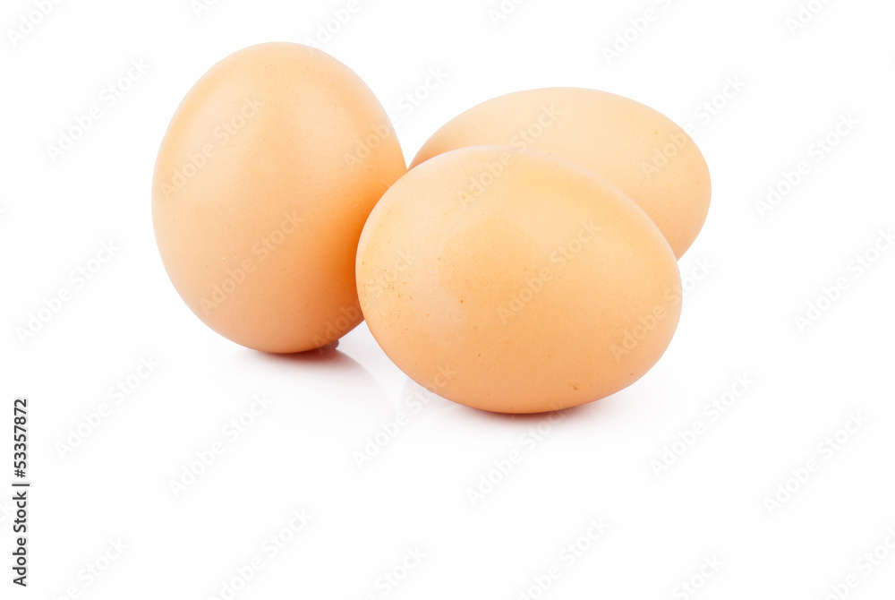 Chicken raw eggs, whole and broken on white, food photo Chicken raw eggs, whole and broken on white, food photo