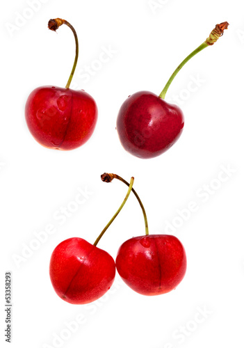 red sweet cherry closeup isolated on white