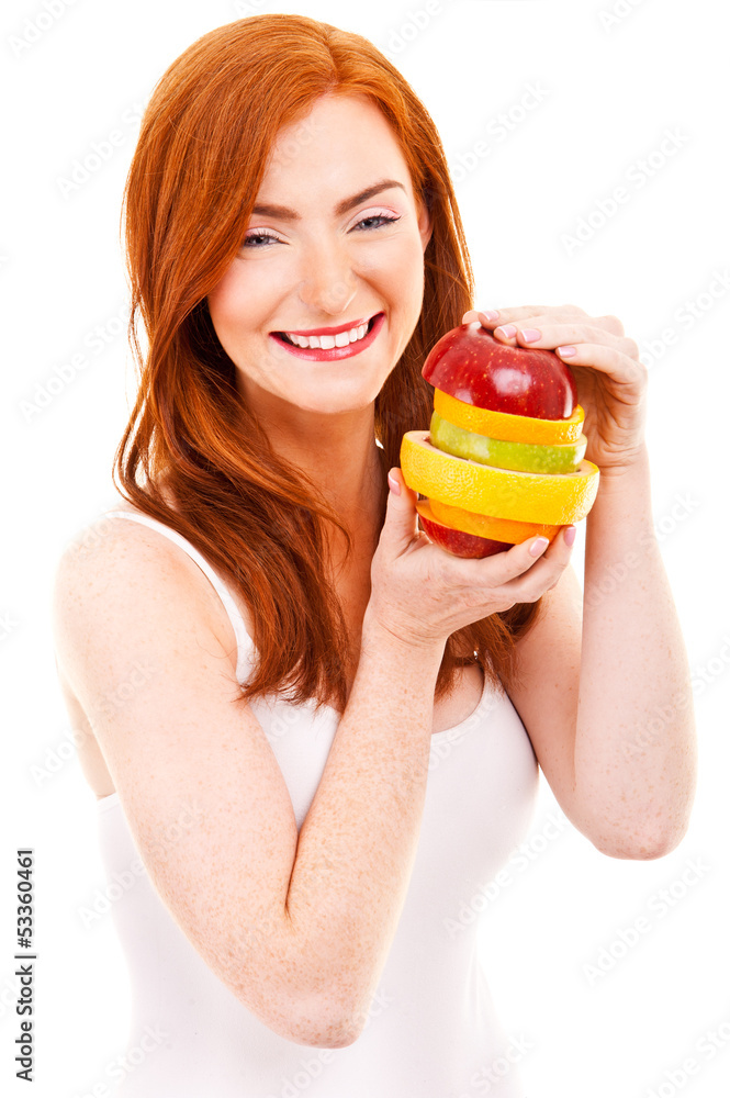 Juicy fruit A close-up of a pretty lady's face with a fresh Juicy fruit A close-up of a pretty lady's face with a fresh