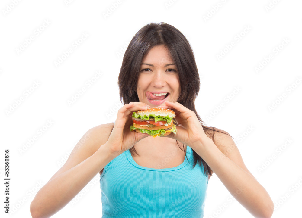 Young woman eat tasty fast food unhealthy burger Young woman eat tasty fast food unhealthy burger