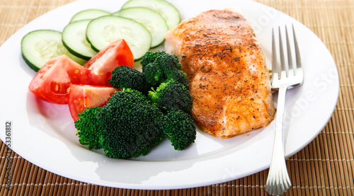 Fresh Broccoli and Ripe Tomatoes with Salmon
