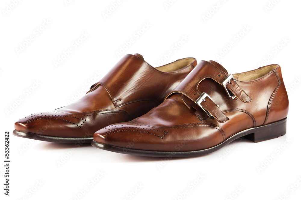 Brown man's shoes isolated on white background.  Pair of brown m