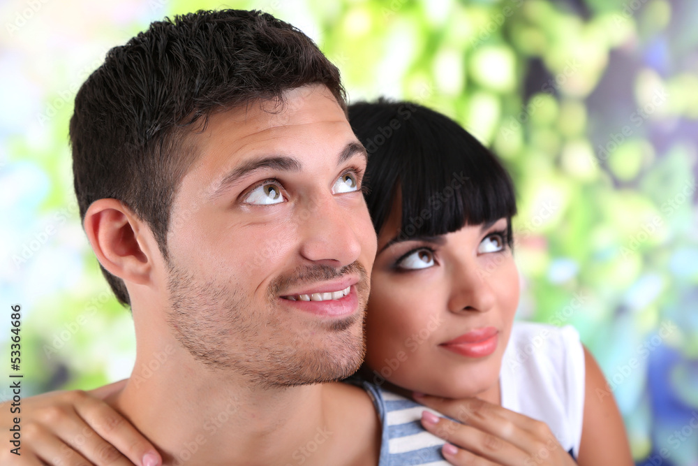 Beautiful loving couple together on natural background Beautiful loving couple together on natural background