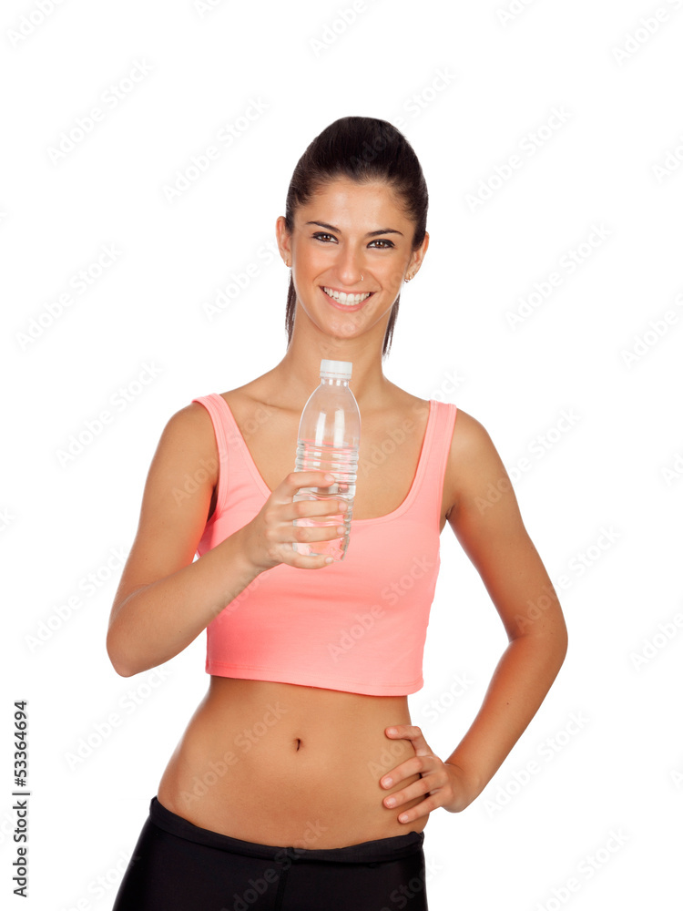 Attractive brunette girl drinking water during training Attractive brunette girl drinking water during training