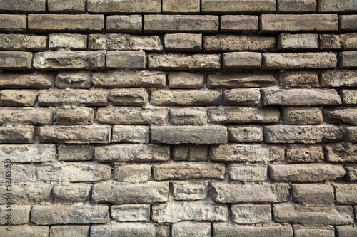 weathered grey bricks wall