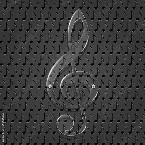 Glass treble clef on metal texture background.