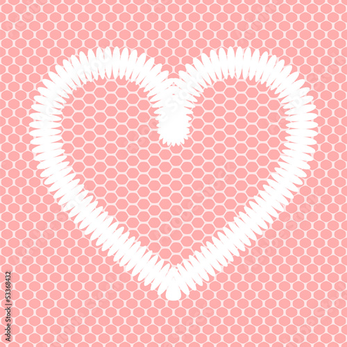 White crochet heart on pink...