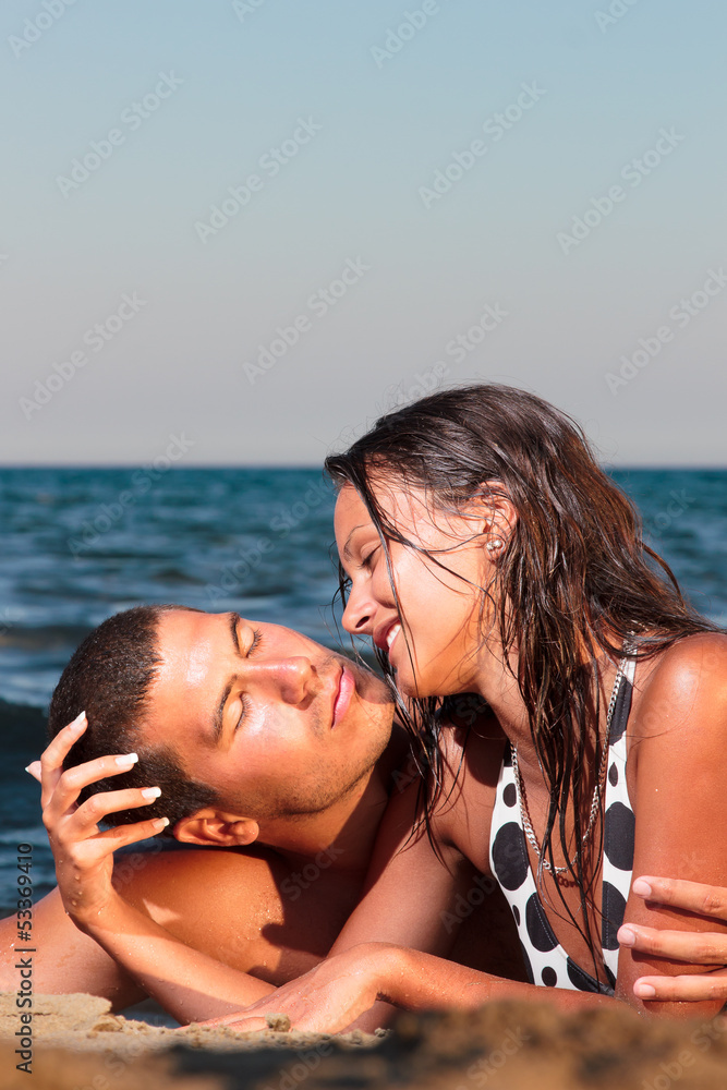 Fototapeta premium Young couple on the beach