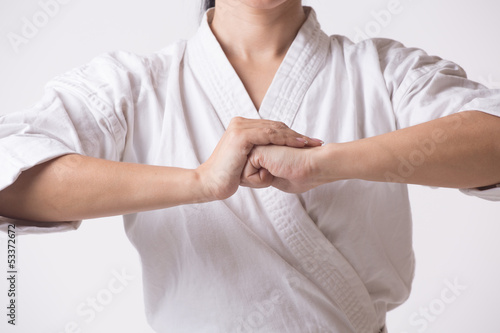 Canvas Print Woman in kimono going for greeting on white