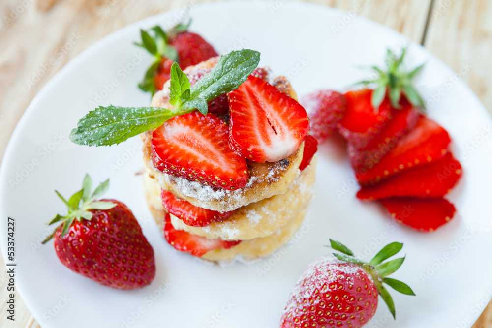 pieces of strawberry curd pancake on pieces of strawberry curd pancake on