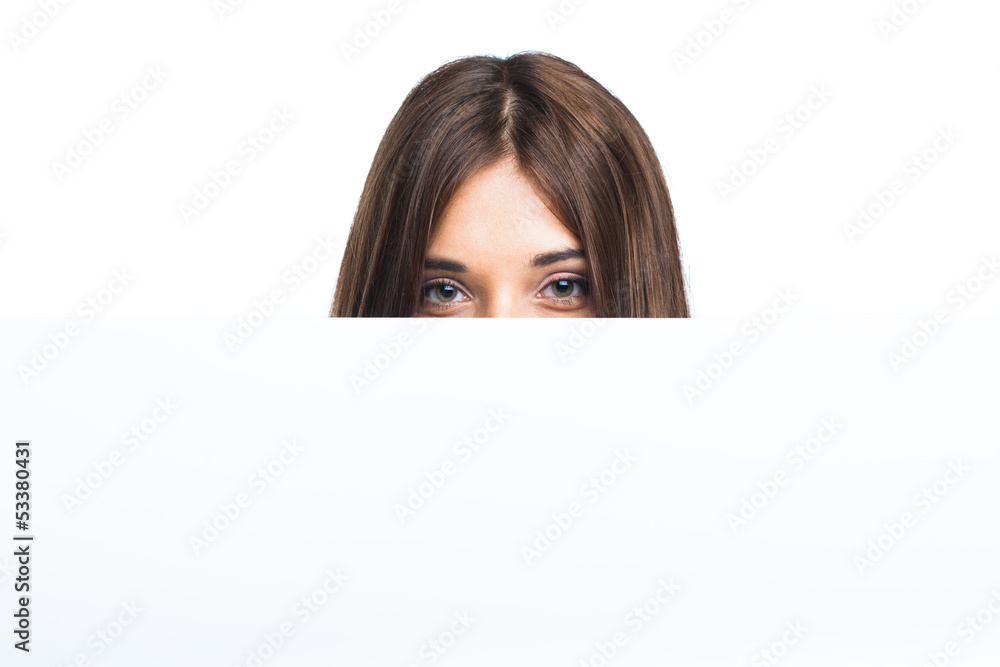 Portrait of a young woman with blank billboard Portrait of a young woman with blank billboard