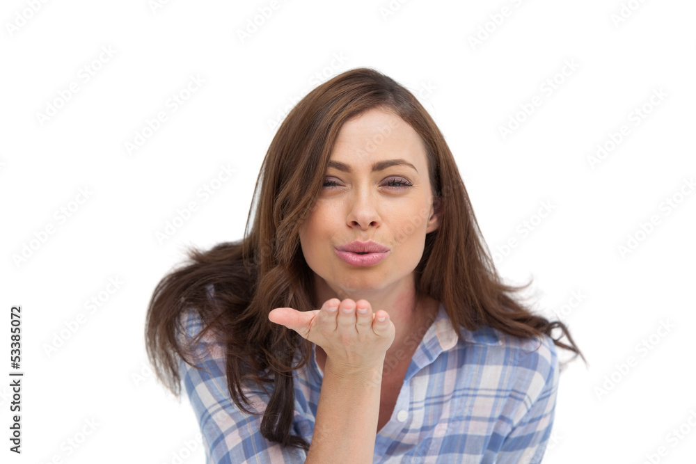 Cute woman blowing a kiss to the camera Cute woman blowing a kiss to the camera