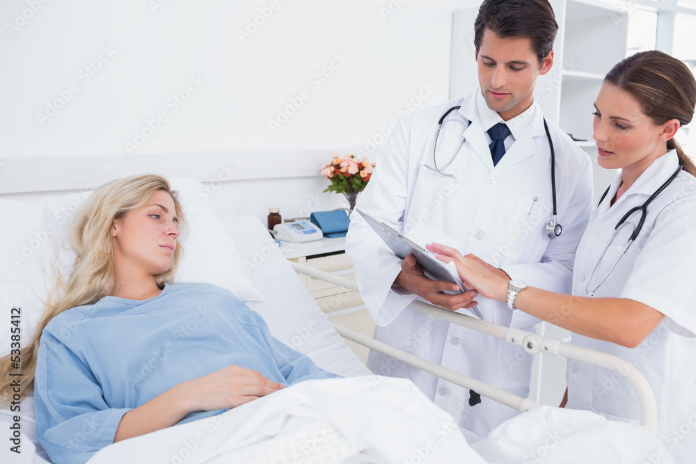Hospitalized woman and doctors Hospitalized woman and doctors