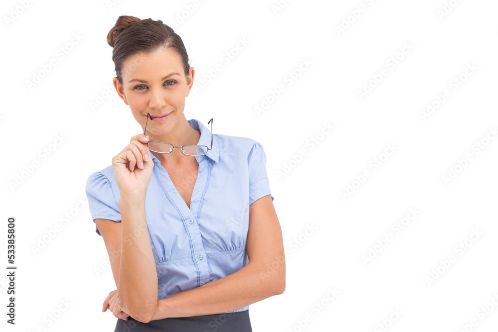 Smiling businesswoman with glasses on her mouth Smiling businesswoman with glasses on her mouth