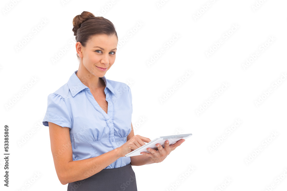 Pretty businesswoman touching digital tablet Pretty businesswoman touching digital tablet