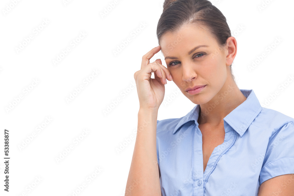 Thinking businesswoman with hand on head Thinking businesswoman with hand on head