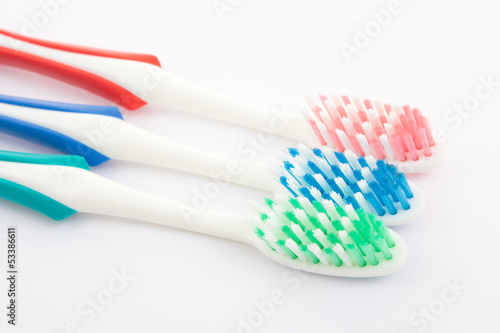 Red  green and blue toothbrush